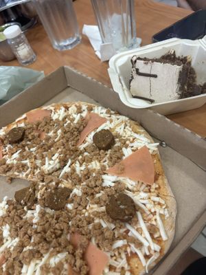 Pizza and mocha cake  at Herbivoro in Cancun