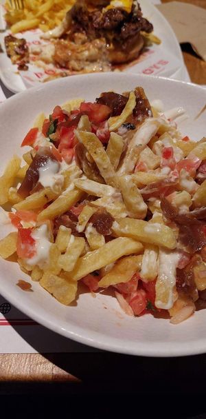fries with vegan mayo, pico de Gallo and caramelized onions at Po' Boys BBQ in Athens