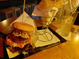 The den burger and gin fizz at The Botanical Den in Lisbon