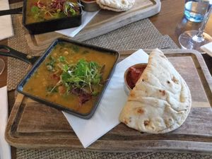 Chick Pea & Green Lentil Dahl with
Crispy shallots, coriander, naan bread & lime pickle at Victoria's in Pitlochry