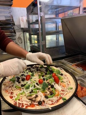 vegetarian pizza at Boston Pizza and Curry in Arlington