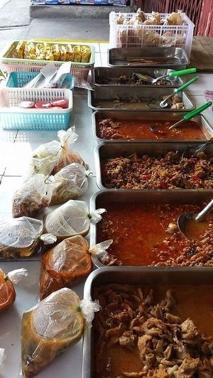 a row of delish local curries at Saam Pow Tip in Chiang Mai