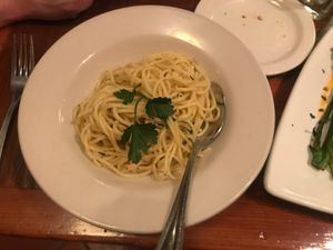 Side of pasta with garlic and oil at Venetian Hot Plate in Port Aransas