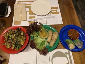 Stir-fry vegetables, spring rolls and wakame summer rolls at Mon Viet in Barcelona