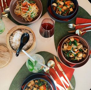 Papaya salad, ginger tofu, and basil tofu at Ukulele Thai Bar & Food in Luxembourg City