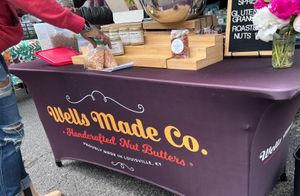 assortment of vegan butter spreads, nuts and granola at The Original Bardstown Road Farmers' Market in Louisville