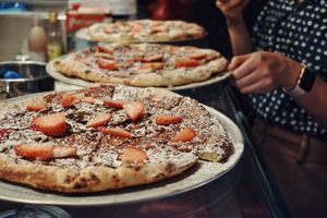 Vegan chocolate dessert pizza with fresh strawberries & powder  at Oregano in Brooklyn