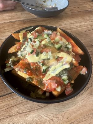 Triple cooked cheese loaded chips   at 2084 in Kowloon