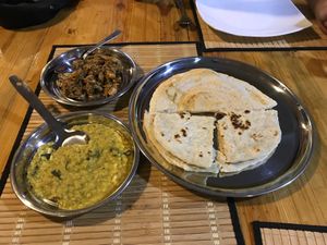 Jackfruit curry top left, Dahl bottom left, dosa top right, roti bottom right at Mint of the Mist in Haputhale