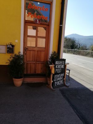 Entrance visible from main road at Dvorska Pekarna in Novo Mesto