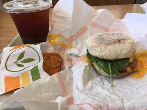 Breakfast combo. Sausage Egg n Cheese Muffin, Hash brown + drink at Plant Power Fast Food in Riverside