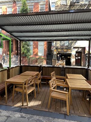 Covered outdoor seating  at Mamoun's Falafel - Greenwich Village in New York City