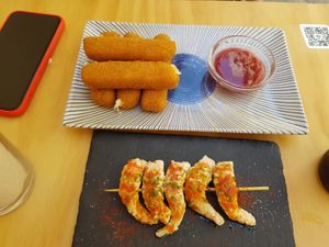 Fingers de queso y pinchito de gambas at La Vegana Taperia in Malaga