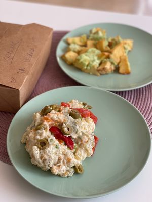 Ensaladilla rusa y patatas con alioli 💚 at La Vegana Taperia in Malaga