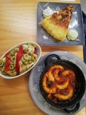 Tortilla de patatas, ensaladilla rusa y gambas al pil pil at La Vegana Taperia in Malaga