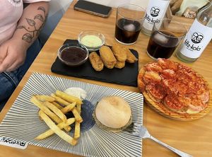 Nuggets de heura, Pulguita de seitan al ajillo and Pulpo a la gallega at La Vegana Taperia in Malaga