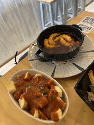 Patatas bravas y gambas al pil pil  at La Vegana Taperia in Malaga