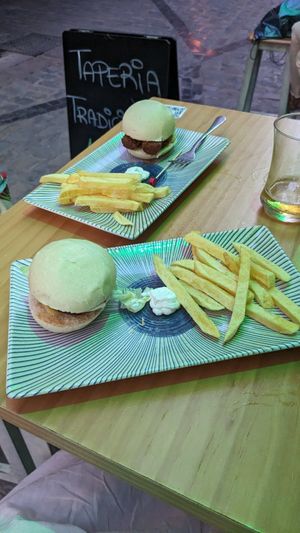 mini hamburguesa y pulguita de choripan at La Vegana Taperia in Malaga