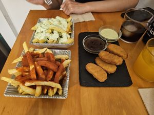 Absolute disappointment of "patatas". These are just soggy fries. at La Vegana Taperia in Malaga