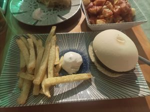 Seitan and garlic sauce with fries at La Vegana Taperia in Malaga