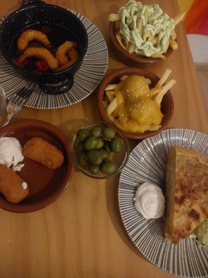 Olives, patatas aioli, meatballs with almond sauce, croquetas del dia, tortilla de patatas at La Vegana Taperia in Malaga