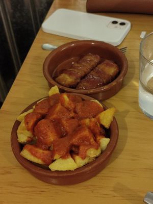Patatas bravas y palitos de queso (tapas) at La Vegana Taperia in Malaga