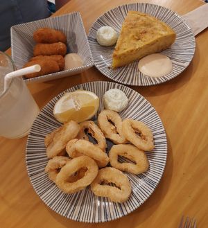Calamares, tortilla de patatas, croquetas del día at La Vegana Taperia in Malaga
