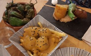 Pimientos padrón, albondigas con almendras, brocheta andaluz at La Vegana Taperia in Malaga