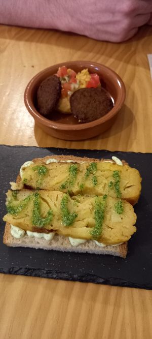Tortilla with a very garlicky sauce at La Vegana Taperia in Malaga