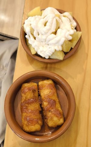 Patatas alioli and queso frito at La Vegana Taperia in Malaga