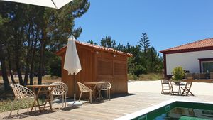 Seating area by the pool at Vegans by the Sea - Country Houses in Santiago Do Cacem