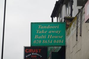 Outdoor signage at The Green Tandoori in South East London