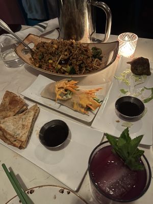 Clockwise from top: spicy Szechuan rice (4/5), veggie dumplings (3/5), spring roll (3/5), scallion pancakes (4/5). Not pictured: Dan Dan noodles (5/5)  at Spicy Moon - 3rd St in New York City