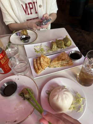 Veggie dumplings, scallion pancakes,and spicy tofu bao   at Spicy Moon - 3rd St in New York City