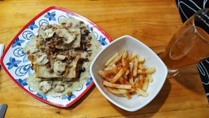 Lasagna y papitas👌 at Mercy Vegan Food in Bogota