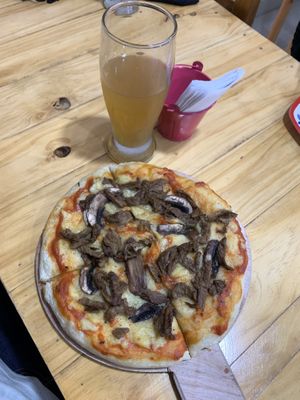 Pizza meat is murder 👌🏽 at Mercy Vegan Food in Bogota