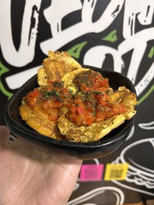 Patacón con hogao   at Mercy Vegan Food in Bogota