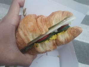 Eggless egg croissant sandwich at Szklarnia in Krakow