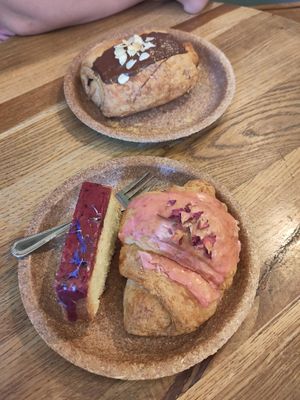 Pain au chocolat, raspberry croissant, and orange cake at Szklarnia in Krakow