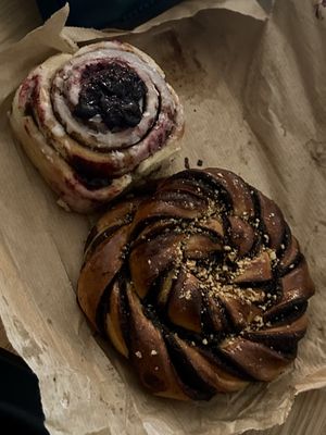Cinnamon roll with blueberry jam and chocolate pastry   at Szklarnia in Krakow