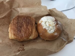 Pain au chocolat and plum bun  at Szklarnia in Krakow