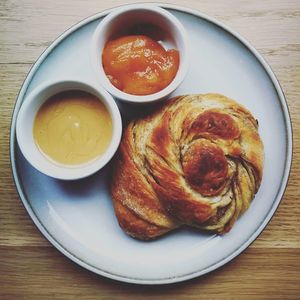 Cardamom bun with sea buckthorn jam and peanut butter :) at Szklarnia in Krakow