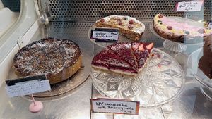 Display of cakes - vegan options are labeled at Cafe Katulki in Berlin