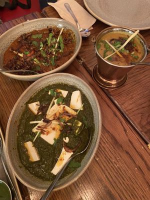 Smoky aubergine curry, yellow daal and spinach and tofu curry at Namaste Holborn in London