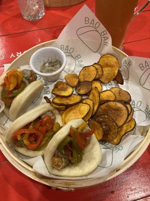Vegan Baos (Sweet potato tater tot, pickled bell peppers, and a hint of Chilean chili) with rustic sweet potato chips  at Bao Bar in Santiago