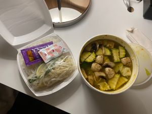 Vegetable broth with mushroom, zucchini(?), broccoli, carrot, cabbage, onion, and tofu. With noodles, bean sprouts, lime, jalapeño, and basil on the side.  at MOE PHO in Pendleton