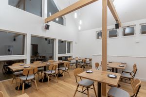 Our second floor has high ceilings offering a spectacular view of Mt. Yotei on a clear day. at Tomo Restaurant Niseko in Kutchan