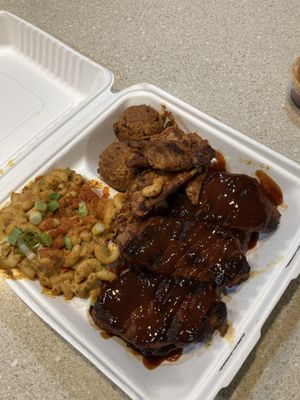 Combo with ribs Mac n cheese hush puppies   at Dirty Lettuce in Portland