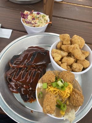 Ribs, coleslaw, cauliflowers, mash gravy chicken  at Dirty Lettuce in Portland