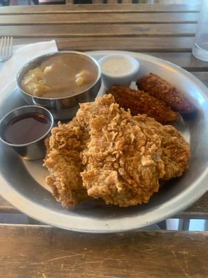 Fried chicken plate with mash and jalapeño poppers.  at Dirty Lettuce in Portland